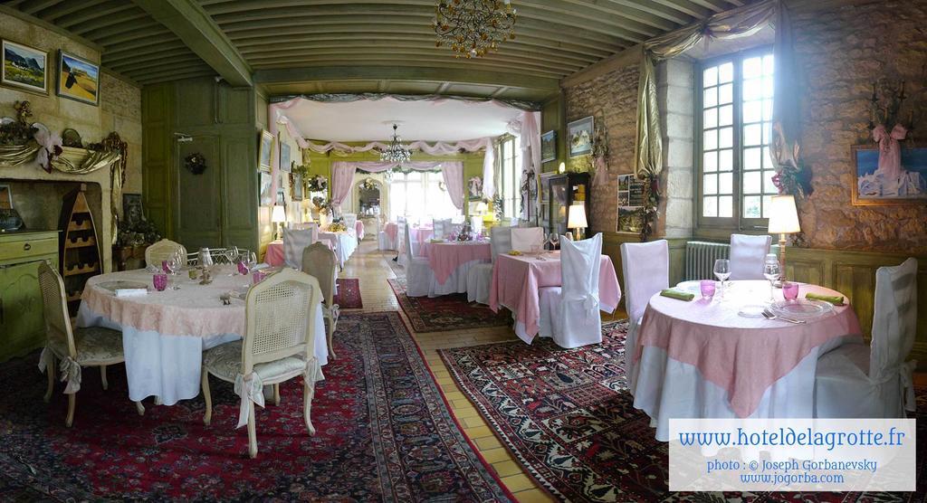 Hotel De La Grotte Монтиньяк Экстерьер фото